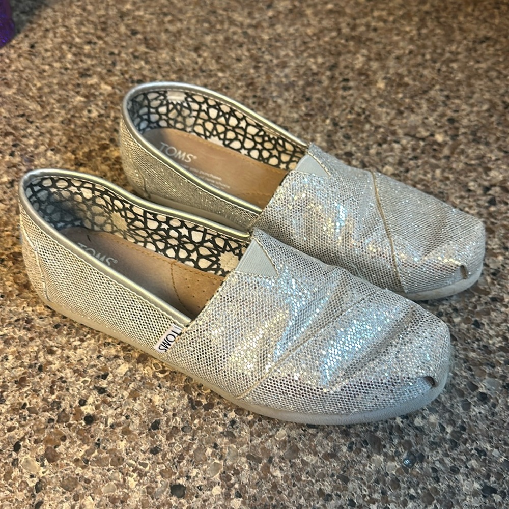 Tom’s sparkly flats